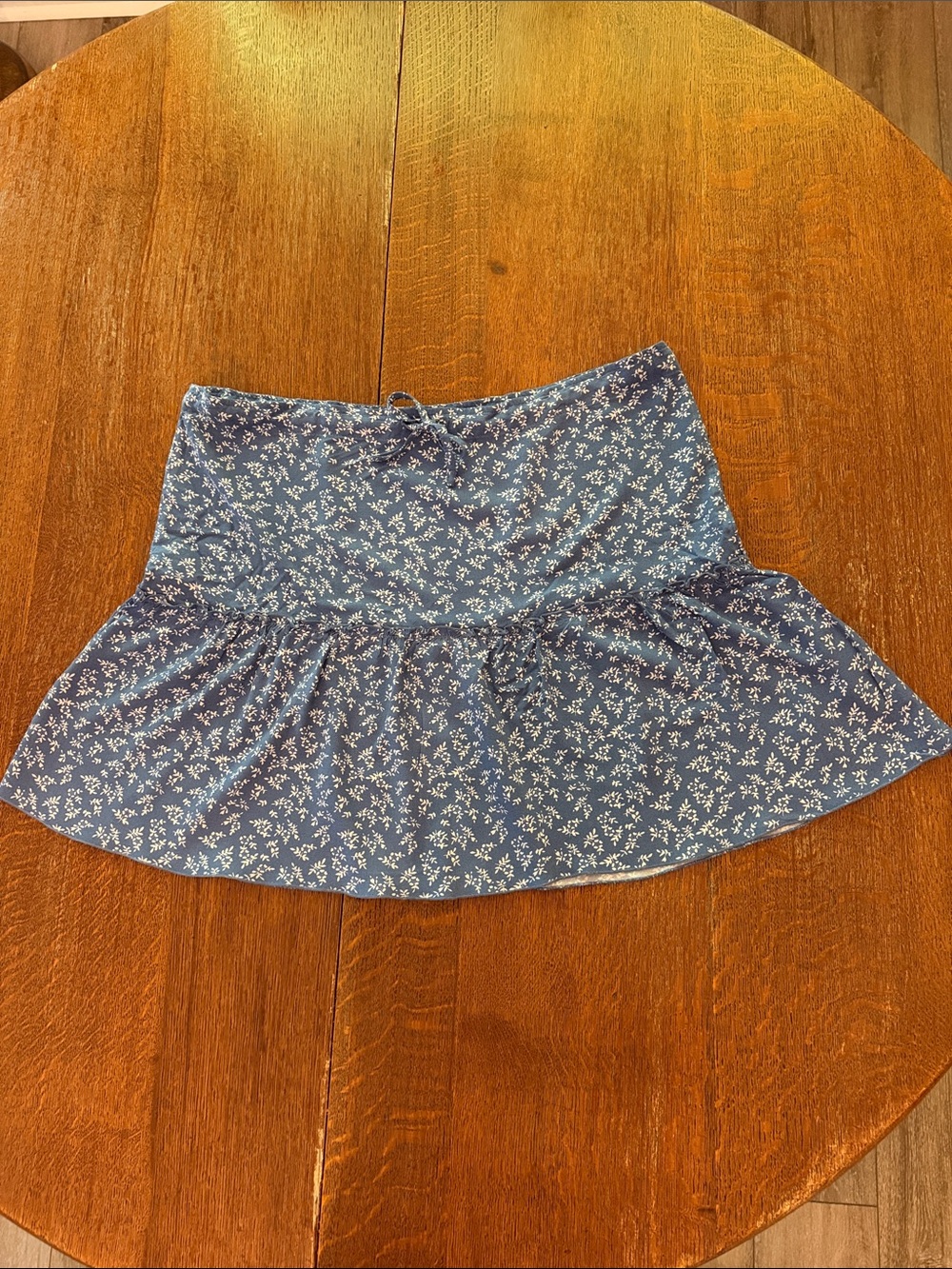 Brandy Melville Blue Mini Skirt with White Floral Print